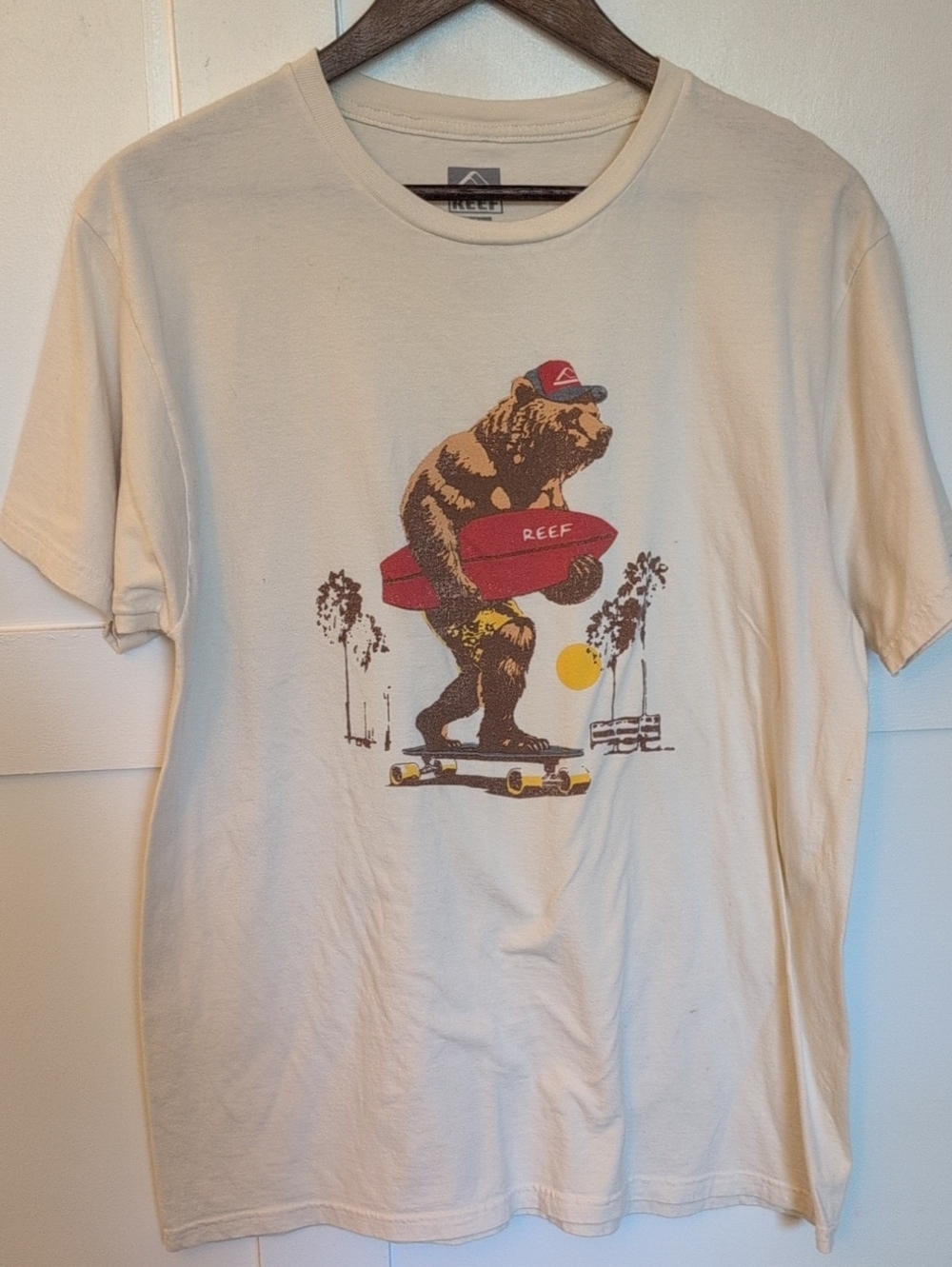 Reef Cream Graphic Bear Surf T‑Shirt with Red Surfboard